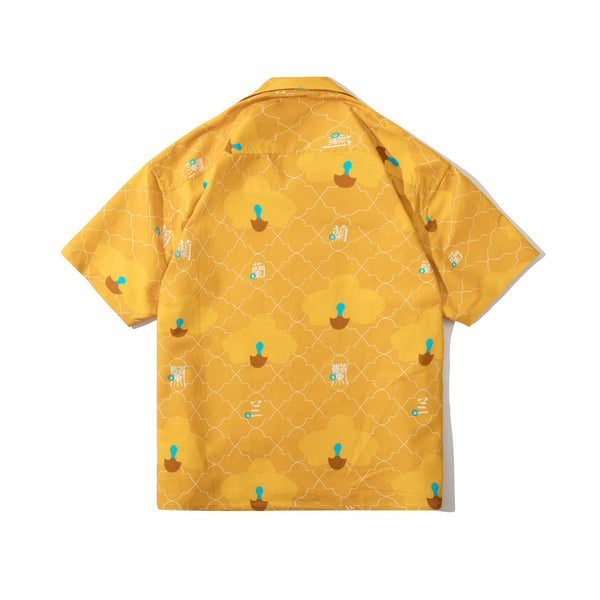 back view of a Hong Kong made GOC Studio yellow orchid cotton shirt