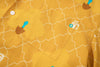 close up of matching patterned chest pocket on a Hong Kong made GOC Studio yellow orchid cotton shirt