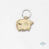 Herr Pong Pig leather Keychain - Gold - GLUE Associates